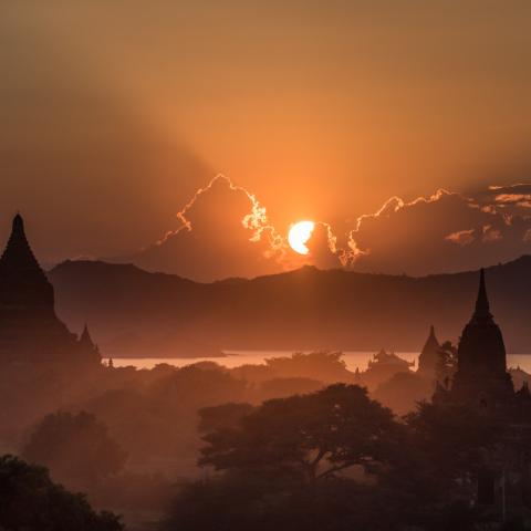 The sun sets behind temples in Bagan | N.Jackson
