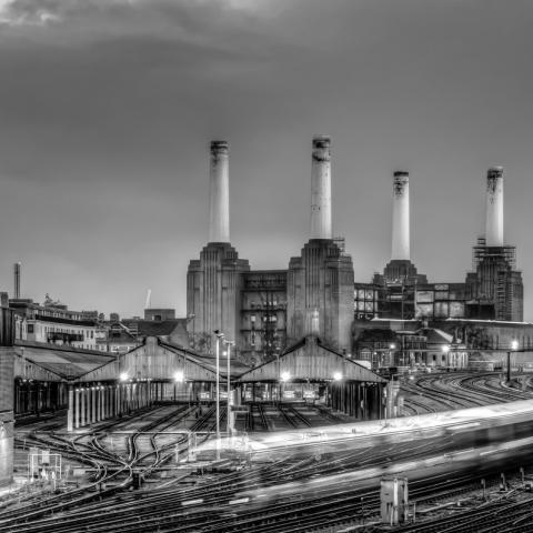 Trains pass Battersea Power Station | N.Jackson